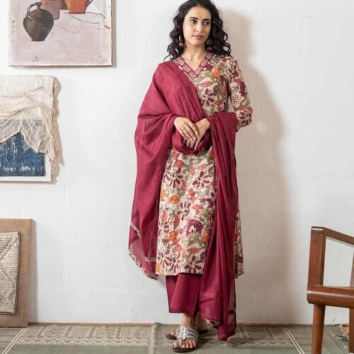 maroon stitched suit