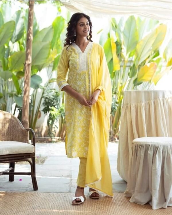 a woman in a yellow dress