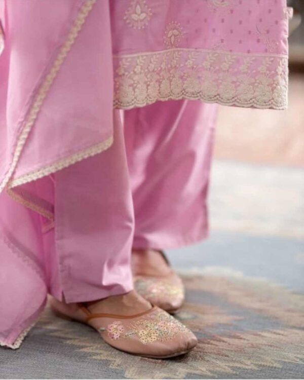 Woman in a cotton stitched suit