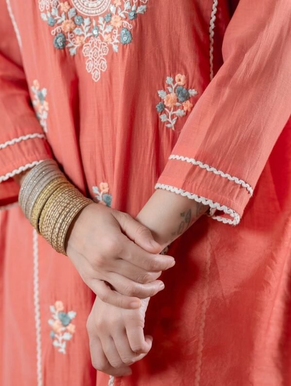 Orange stitched suit