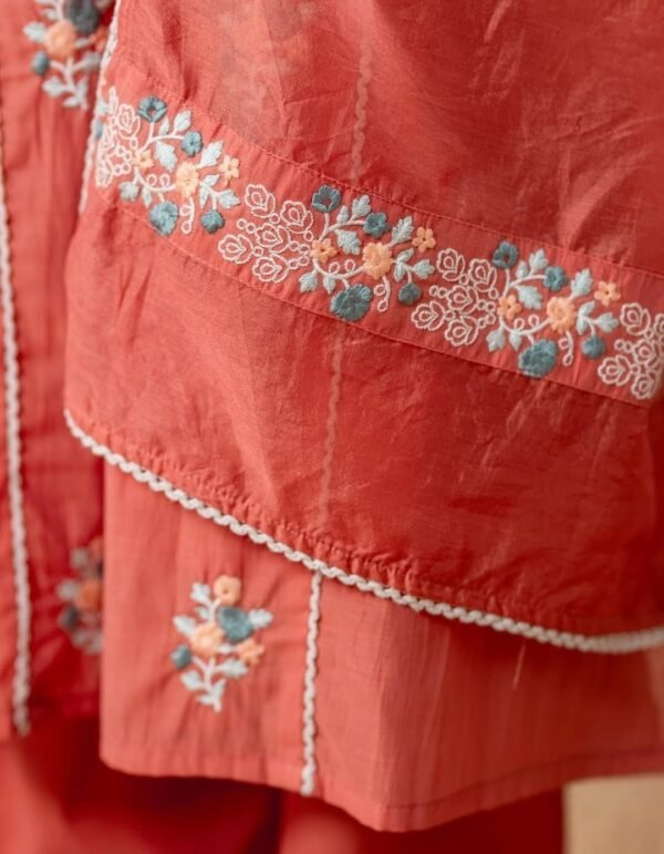 Orange stitched suit