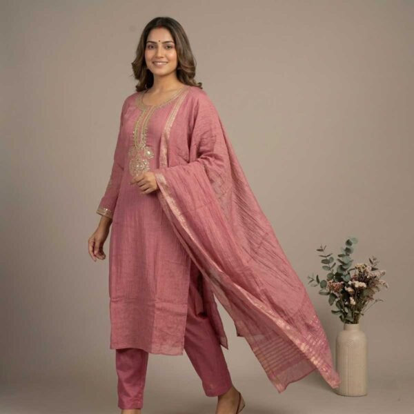 dusty rose stitched suit