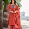 rust orange stitched suit