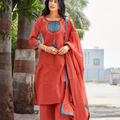 rust orange stitched suit