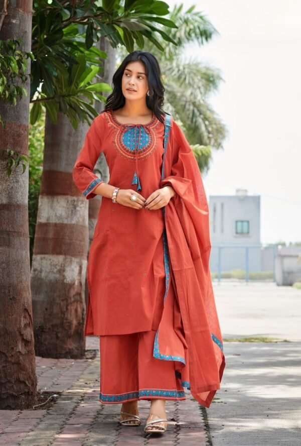 rust orange stitched suit